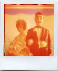 polaroid pinhole photograph of bride & groom